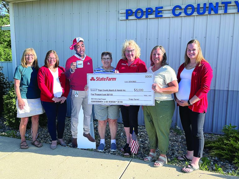 State Farm Agent Amy Roers recognized, designates 5,000 grant to food